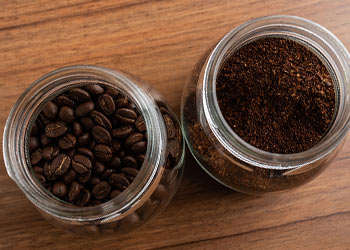 Barista with Bartell Drugs Coffee Bean Storage