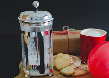 Barista with Bartell Drugs Latte French press
